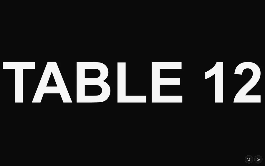 The words TABLE 12 filling a black screen
